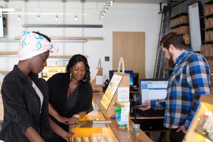 women in a cannabis dispensary