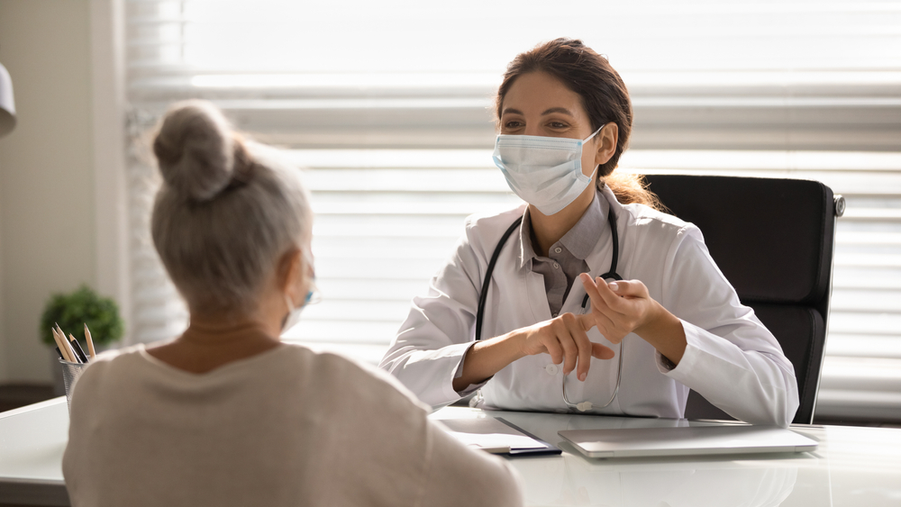 A patient discusses medical marijuana with her doctor